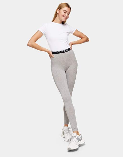 Leggings grises con cinturilla con detalle de la marca de Topshop