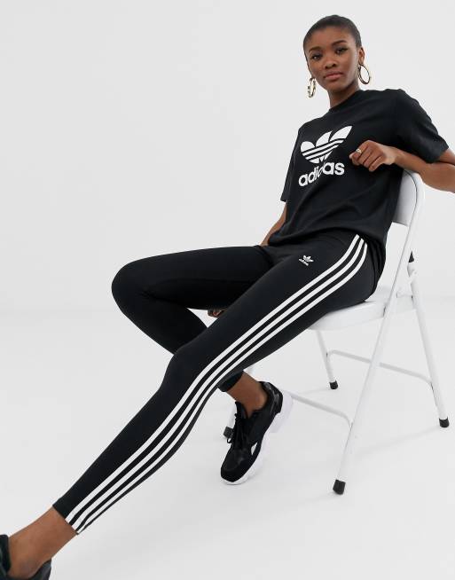 Leggings negros con tres rayas adicolor de adidas Originals
