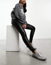 Leggings negros de canalé con etiqueta frontal de Topshop