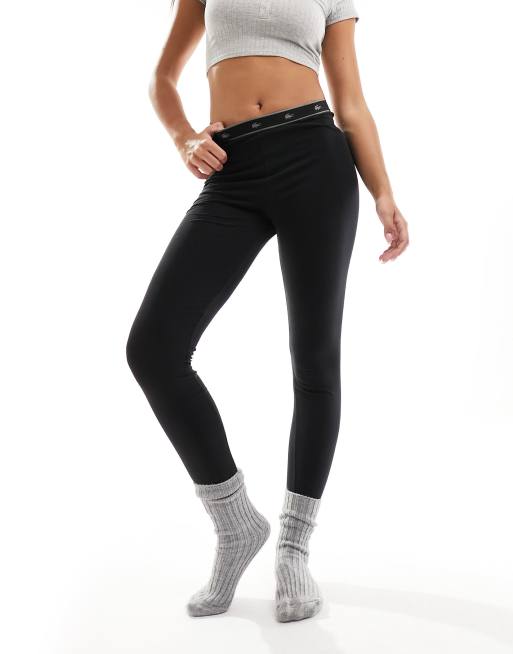 Leggings negros con detalle de la marca de Topshop