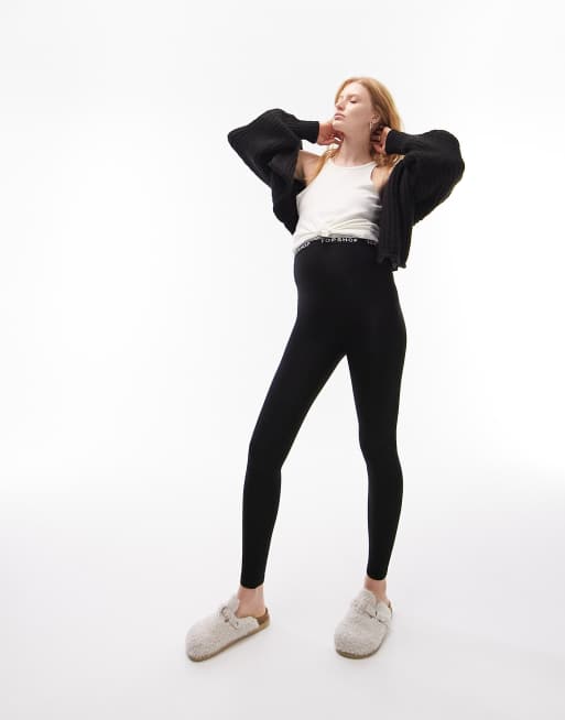 Leggings negros elásticos con detalle de la marca de Topshop Maternity
