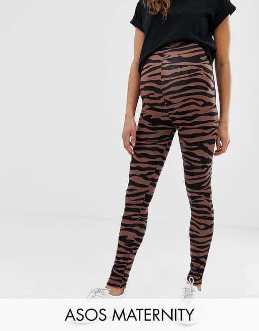 Leggings por encima de la barriga exclusivos en estampado de tigre oscuro de ASOS DESIGN Maternity