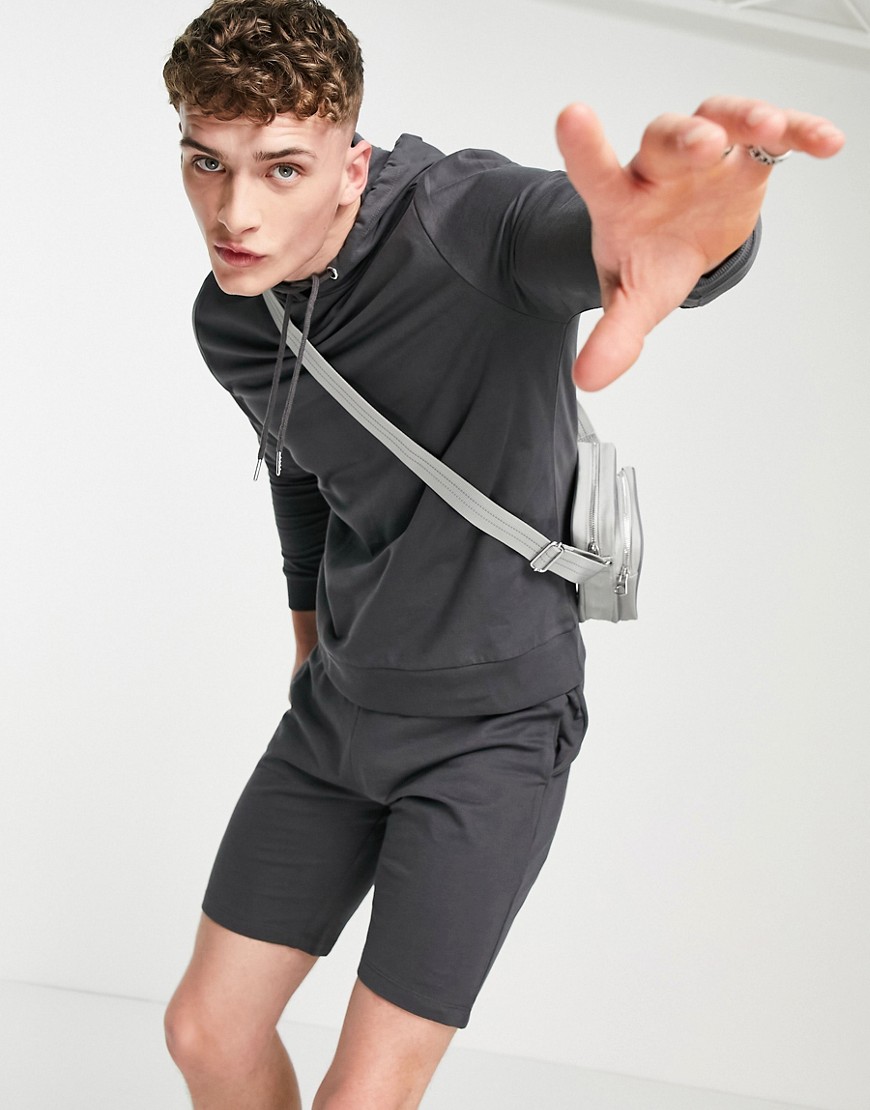 фото Легкий спортивный костюм из худи и зауженных шорт из органического хлопка винтажного черного выбеленного оттенка asos design-черный