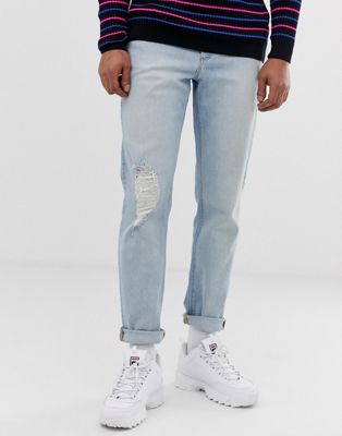 Let forvaskede tapered fit-jeans i vintage model med knæhul fra ASOS DESIGN-Blå