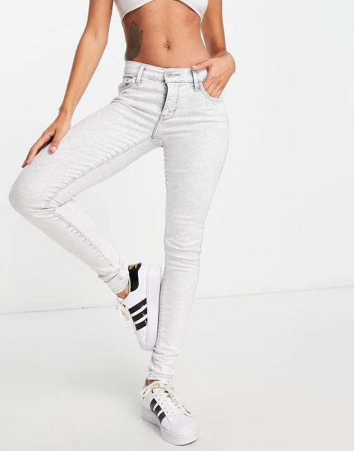 Levi's 710 super 2025 skinny jeans white