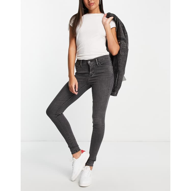 Levi s 310 shaping super skinny jeans in black ASOS