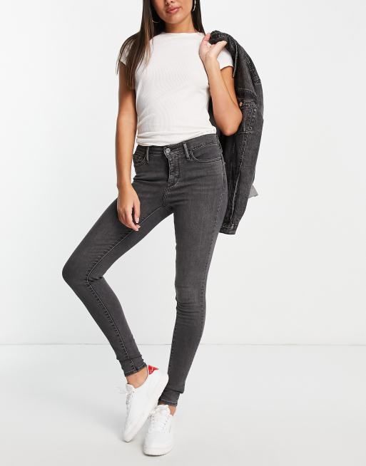 Levi s 310 shaping super skinny jeans in black ASOS