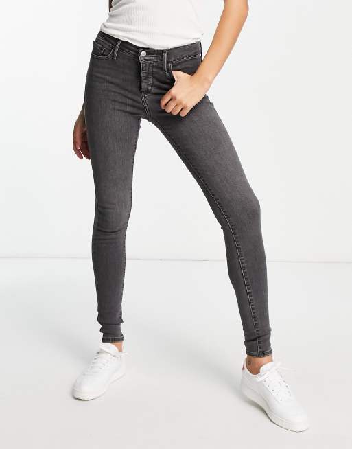 Levi's 310 shaping super skinny jeans in black | ASOS