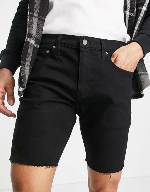 Levi's 412 slim fit denim shorts in its black cut off flex stretch wash