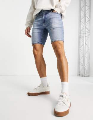 levis ripped denim shorts