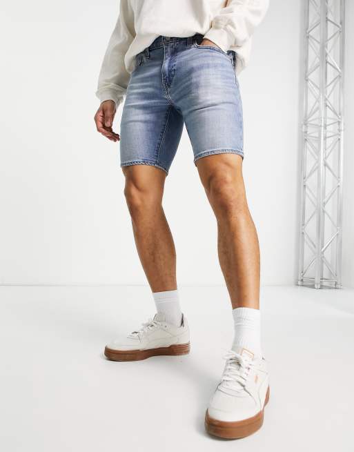 Levi's 412 slim fit denim shorts in light blue wash | ASOS