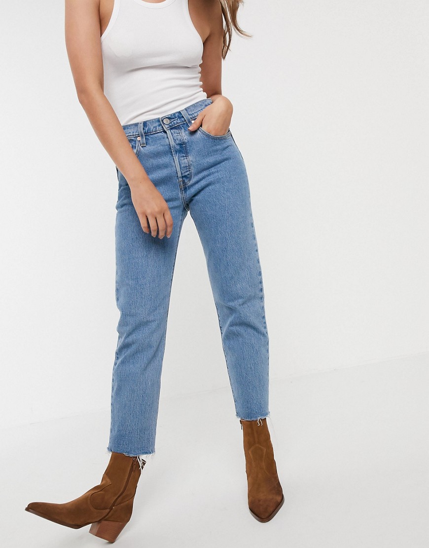 Levi's 501 crop jeans with frayed hem in midwash blue