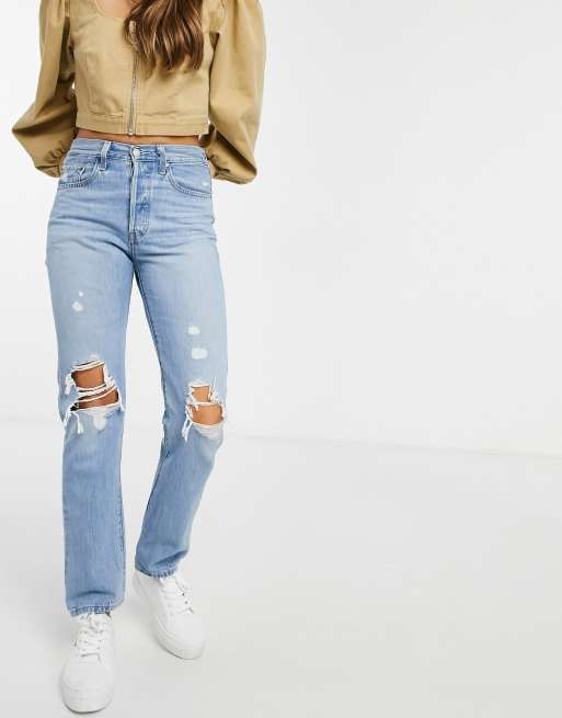 Levi's 501 crop jeans with knee rips in mid wash blue