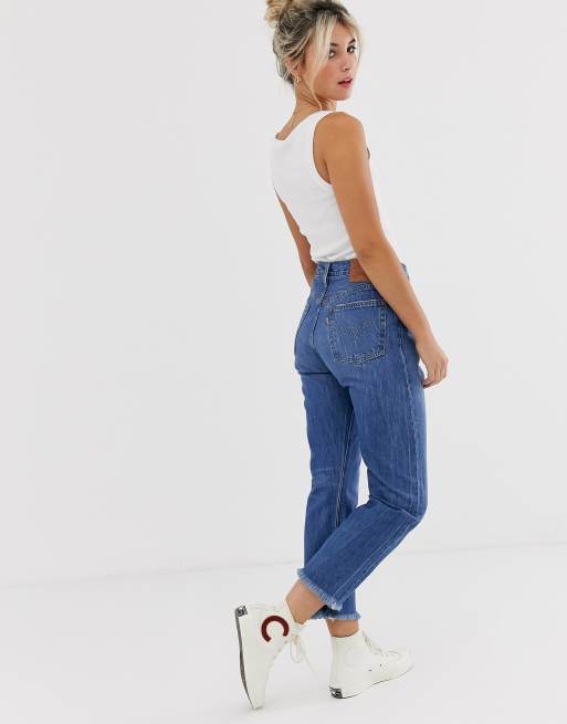 Levi s 501 crop jeans with raw hem in midwash blue