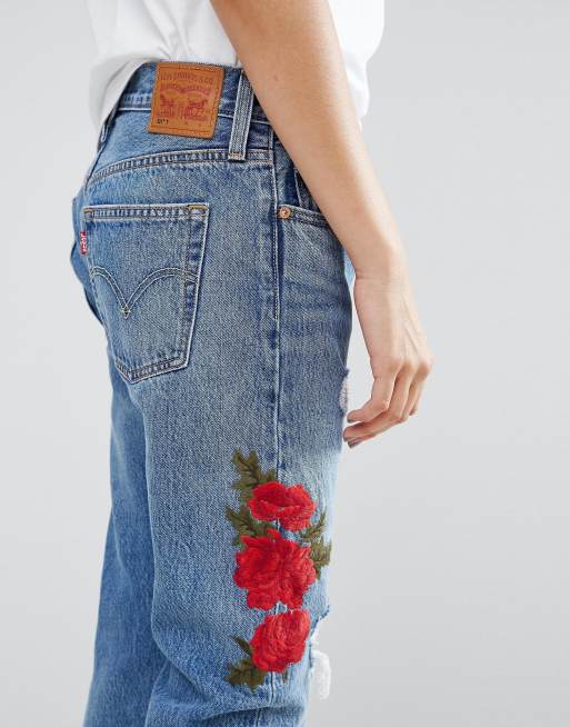 Jeans with best sale rose embroidery