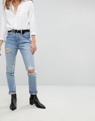 501 skinny light blue distressed jeans