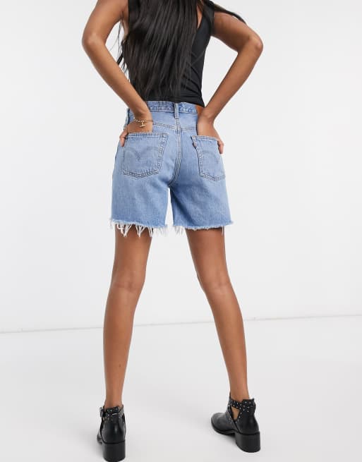 Levi's 501 mid thigh shorts in midwash blue