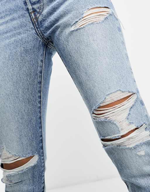 Levis 501 ripped skinny jeans best sale