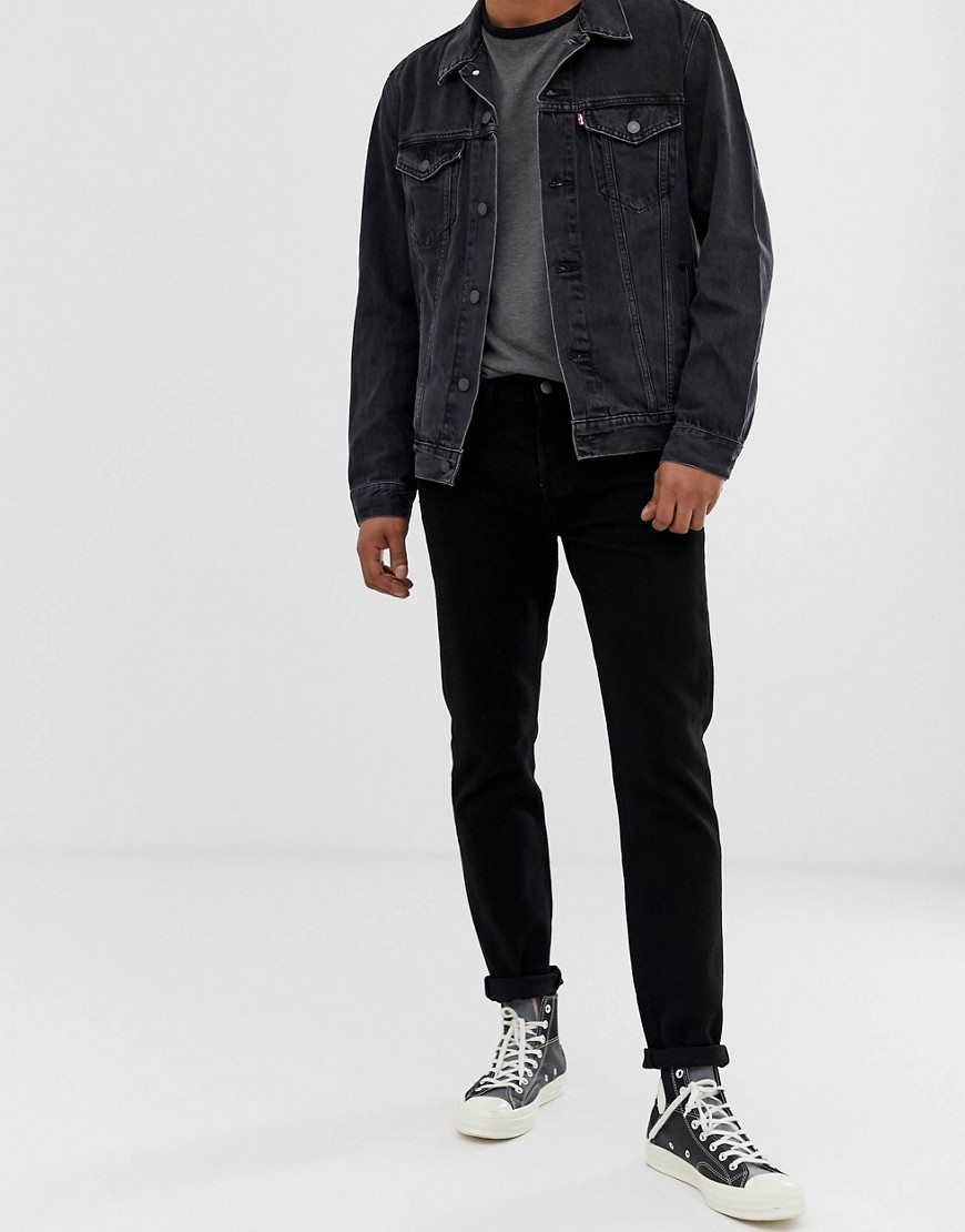 Levi's 501 slim tapered low rise jeans in black black overdye