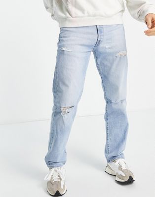 Levi's 501 straight fit jeans in light blue wash with rips