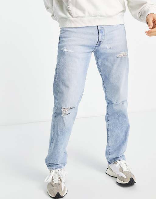 Levi s 501 straight fit jeans in light blue wash with rips