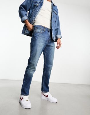 Levi's 502 tapered fit jeans in mid blue wash - ASOS Price Checker