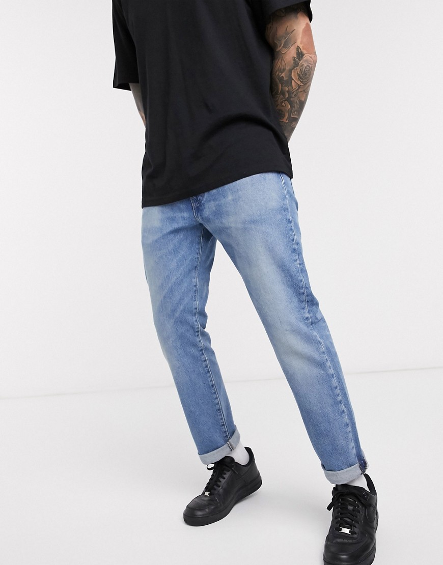 Levi's 502 – Mellanblå avsmalnande jeans i regular fit