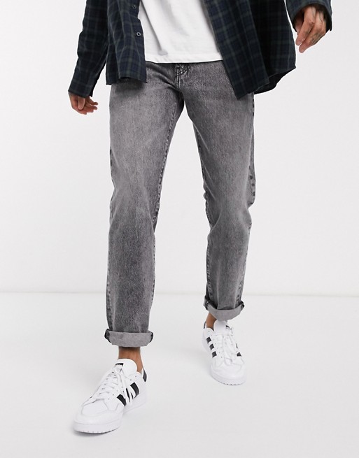 Levi's 502 regular tapered fit jeans in adjustable black acid wash