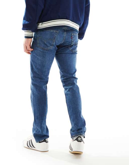 Levi's 502 taper fit jeans in mid blue ASOS