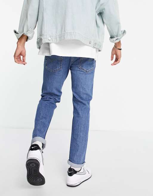 Levi's 502 taper hi ball jeans in blue | ASOS