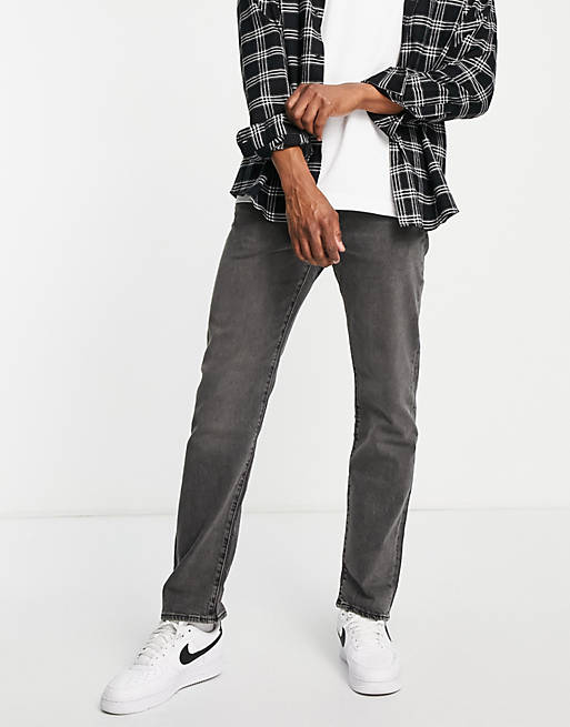 Levi's 502 taper jeans in black wash | ASOS