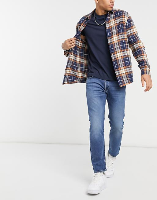 Levi's 502 taper jeans in corfu too static flex stretch mid indigo worn in wash | ASOS