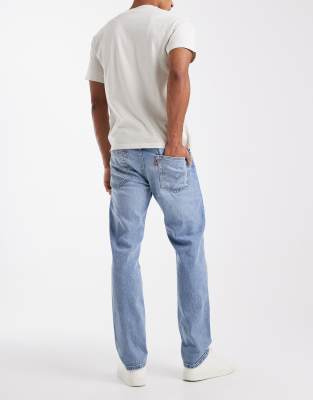 Levi's 502 Tapered Fit Jeans In White