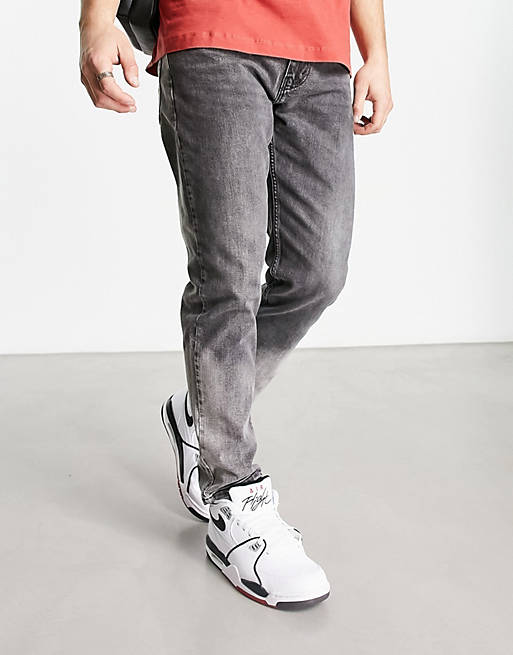 Levi's 502 tapered fit jeans in dipped grey wash | ASOS