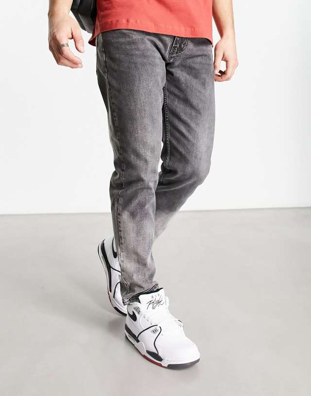 Levi's - 502 tapered fit jeans in dipped grey wash