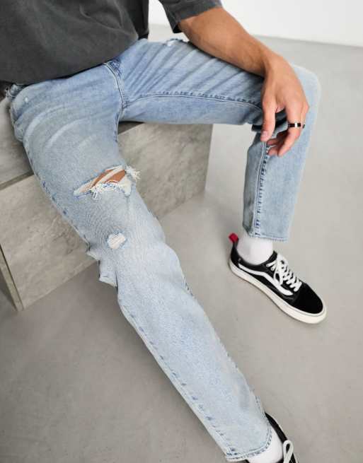 Levi's 502 hot sale ripped jeans