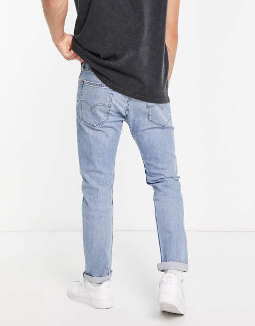 Levi's 502 tapered fit jeans in light blue wash | ASOS