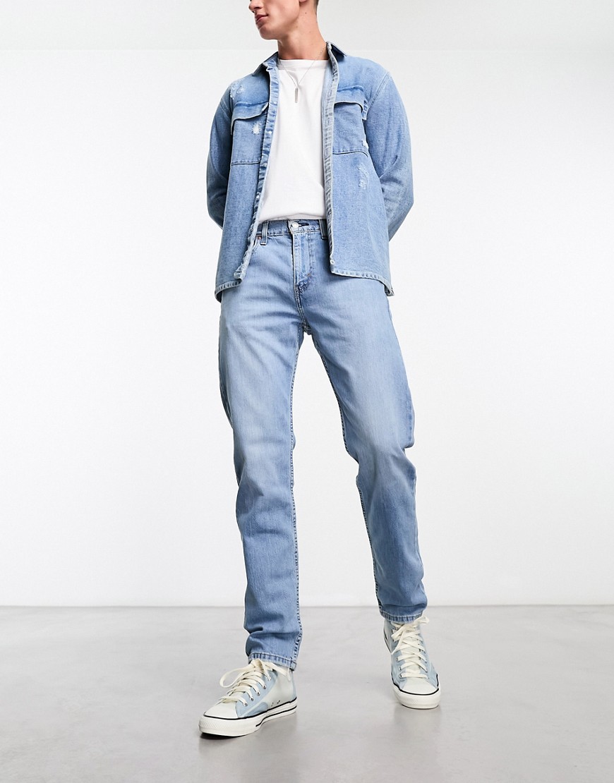 Levi’s 502 tapered fit jeans in light blue wash
