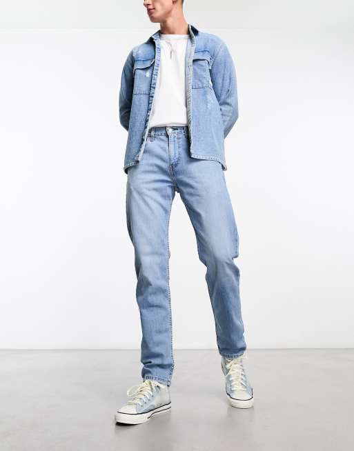 Levi's 502 tapered fit jeans in light blue wash | ASOS