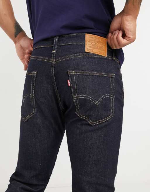 Levi s 502 tapered fit jeans in rock cod dark wash