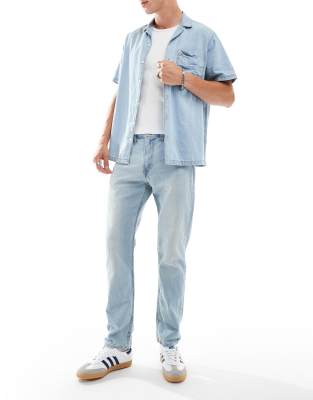 Levi's 502 tapered fit performance cool denim jeans in light blue