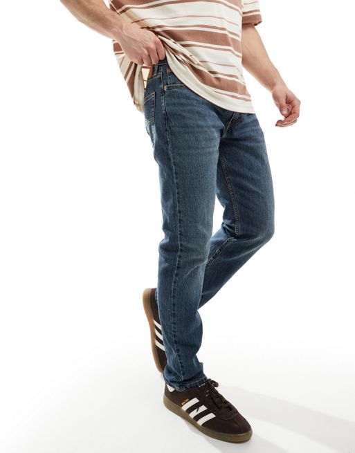 Levi's 502 tapered fit performance cool denim jeans in mid blue