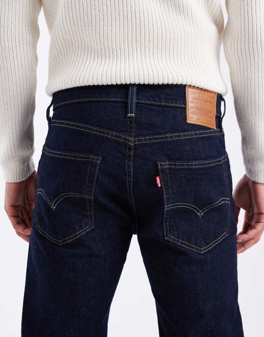 Levi's 502 tapered jeans in dark wash, 4 of 5