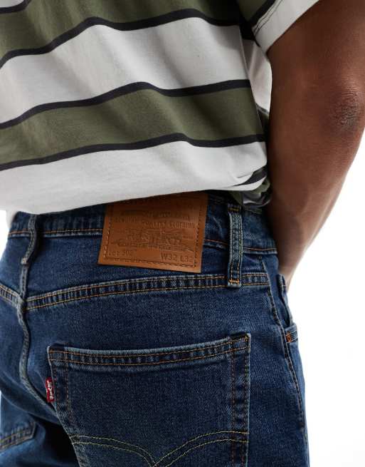 Levi's 502 tapered jeans in mid blue, 3 of 5