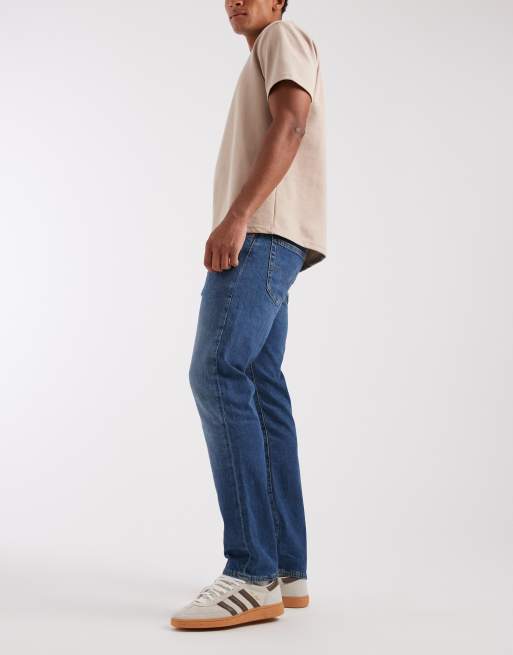 Levi's 502 tapered jeans in mid blue, 3 of 5