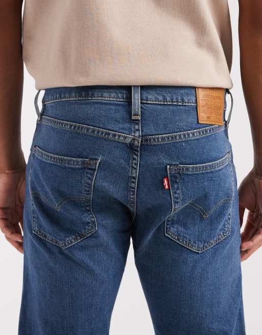 Levi's 502 tapered jeans in mid blue, 4 of 5