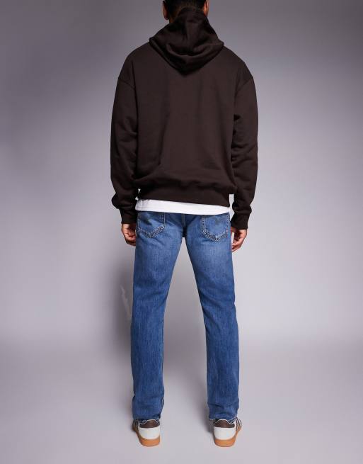Levi's 502 tapered jeans in mid wash, 3 of 5
