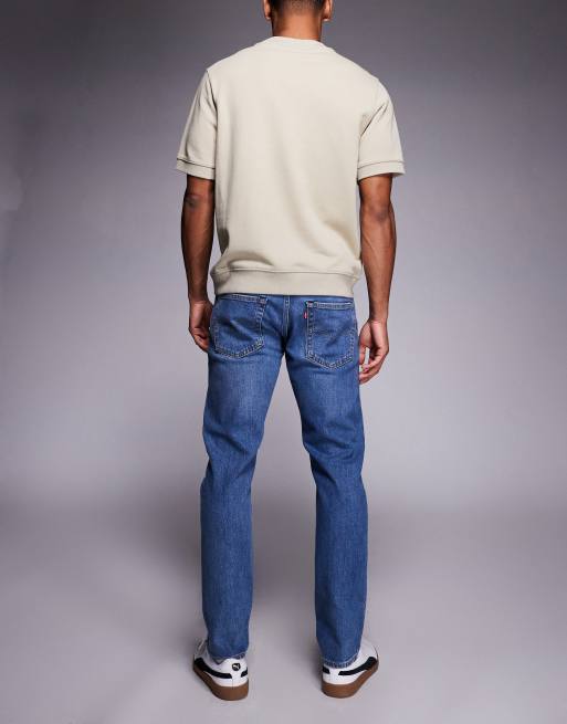 Levi's 502 tapered jeans in mid wash, 2 of 5