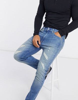 levis 510 ripped jeans
