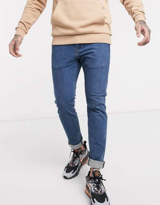 Levi's 510 skinny fit jeans in delray pier 4-way stretch mid wash | ASOS